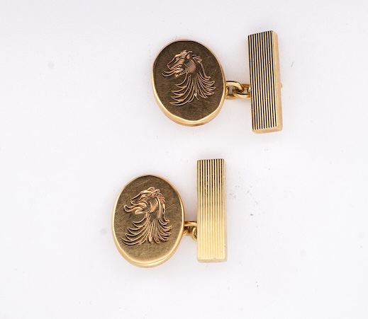 A pair of Elizabeth II 18ct gold oval cufflinks, engraved with lion's head crest, S.J. Rose & Son, Birmingham, 1973, 22 grams. Condition - fair